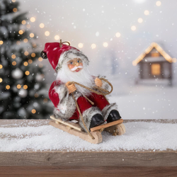 Vianočná ozdoba Santa na saniach